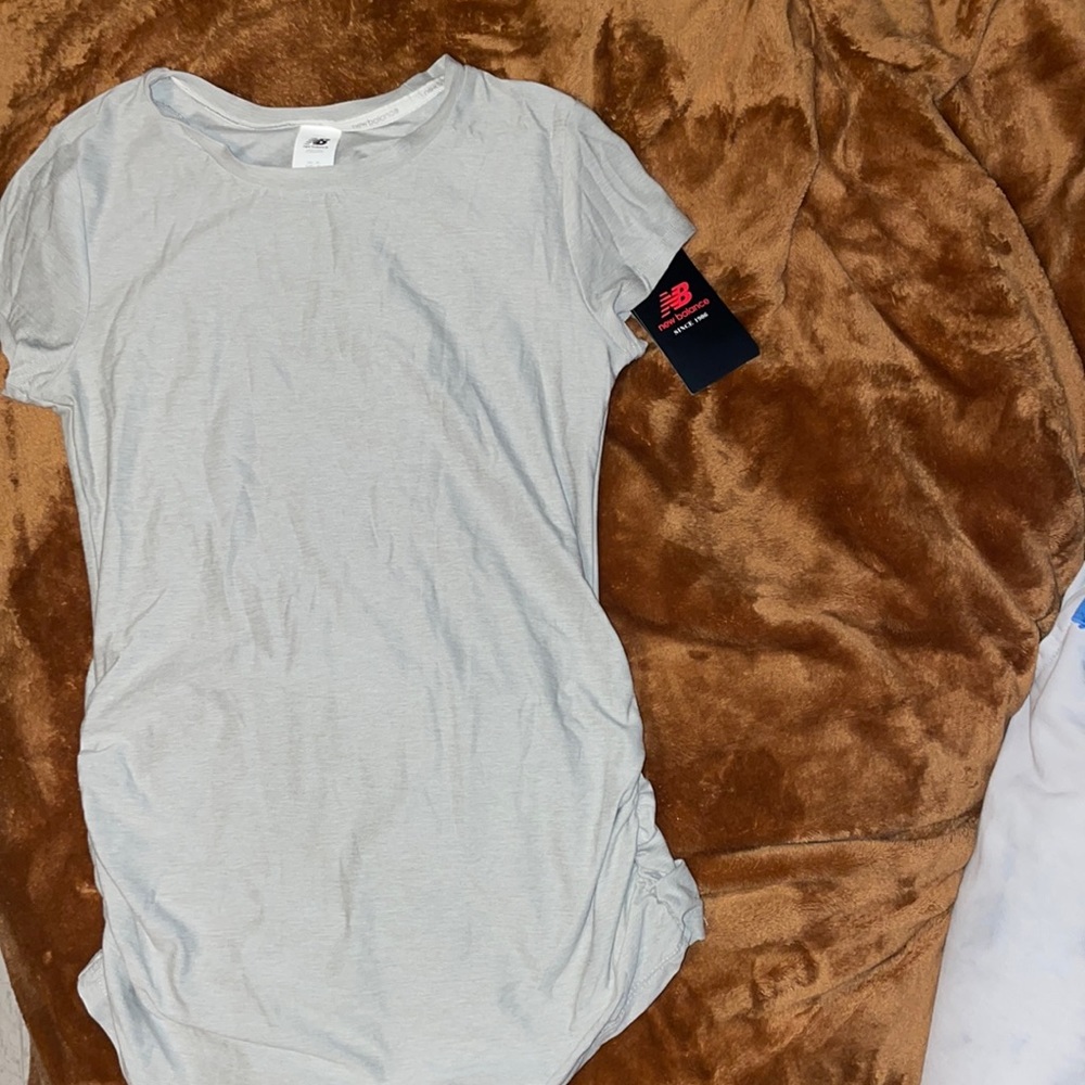 XS new balance shirt
